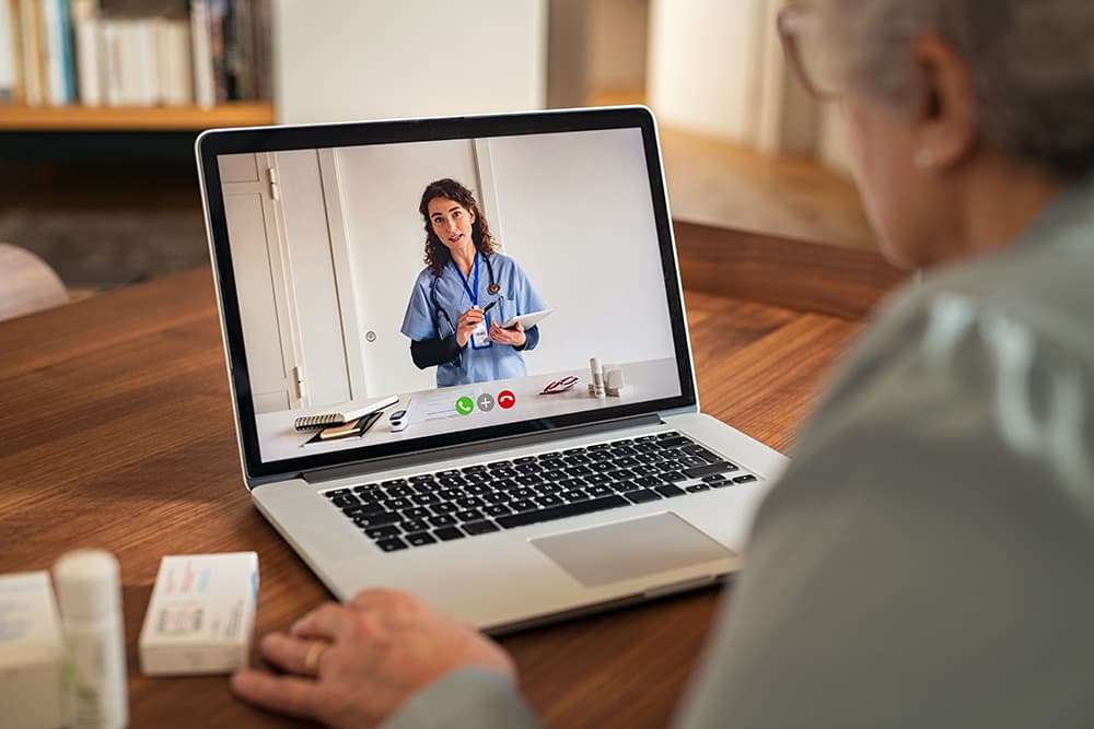How to market your telehealth services in 2022 4 Senior woman in video tele medicine call with doctor